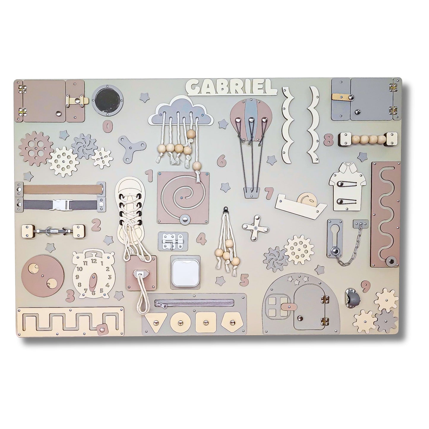 Baby pastel busy board with various educational elements on a white background