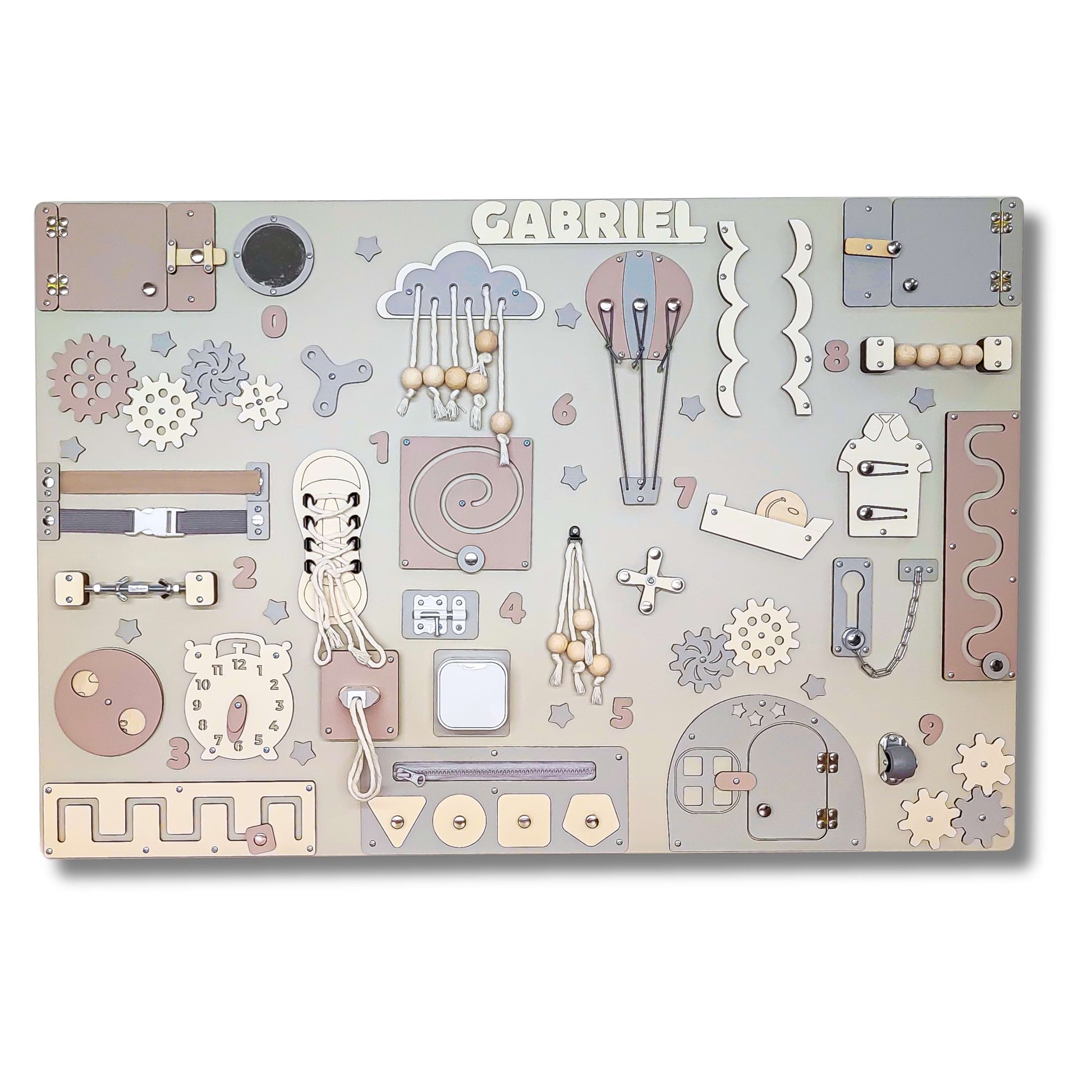 Baby pastel busy board with various educational elements on a white background